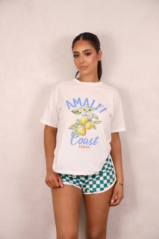 Models wearing a graphic tee and shorts set.