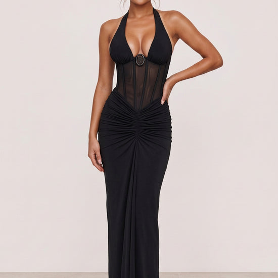 Amaya Sheer Corset Halter Maxi Dress in black, full-length front view with a plunging neckline and ruched maxi dress.